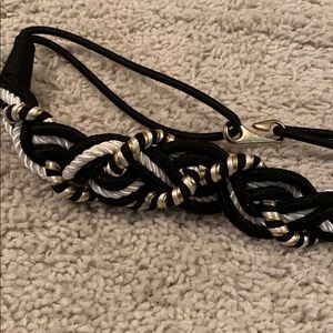 Thick, woven black/white/gold belt